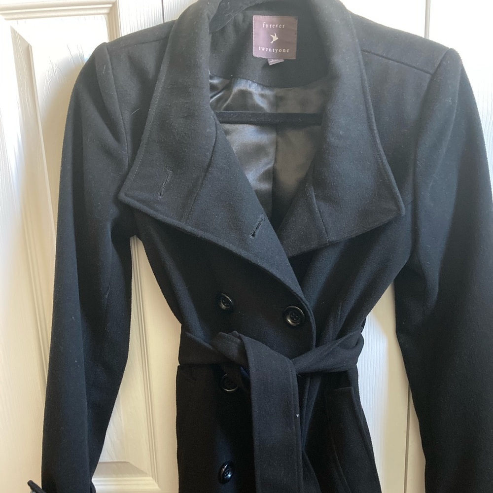 A black Trench Coat with belt.